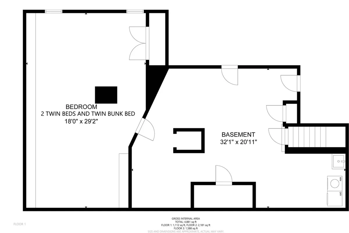 The image features a basement area with two twin beds and a twin bunk bed, evoking a playful, sleepover-ready atmosphere for children or multiple guests. The space is designed for bonding and fun, with colorful bedding and a relaxed vibe.