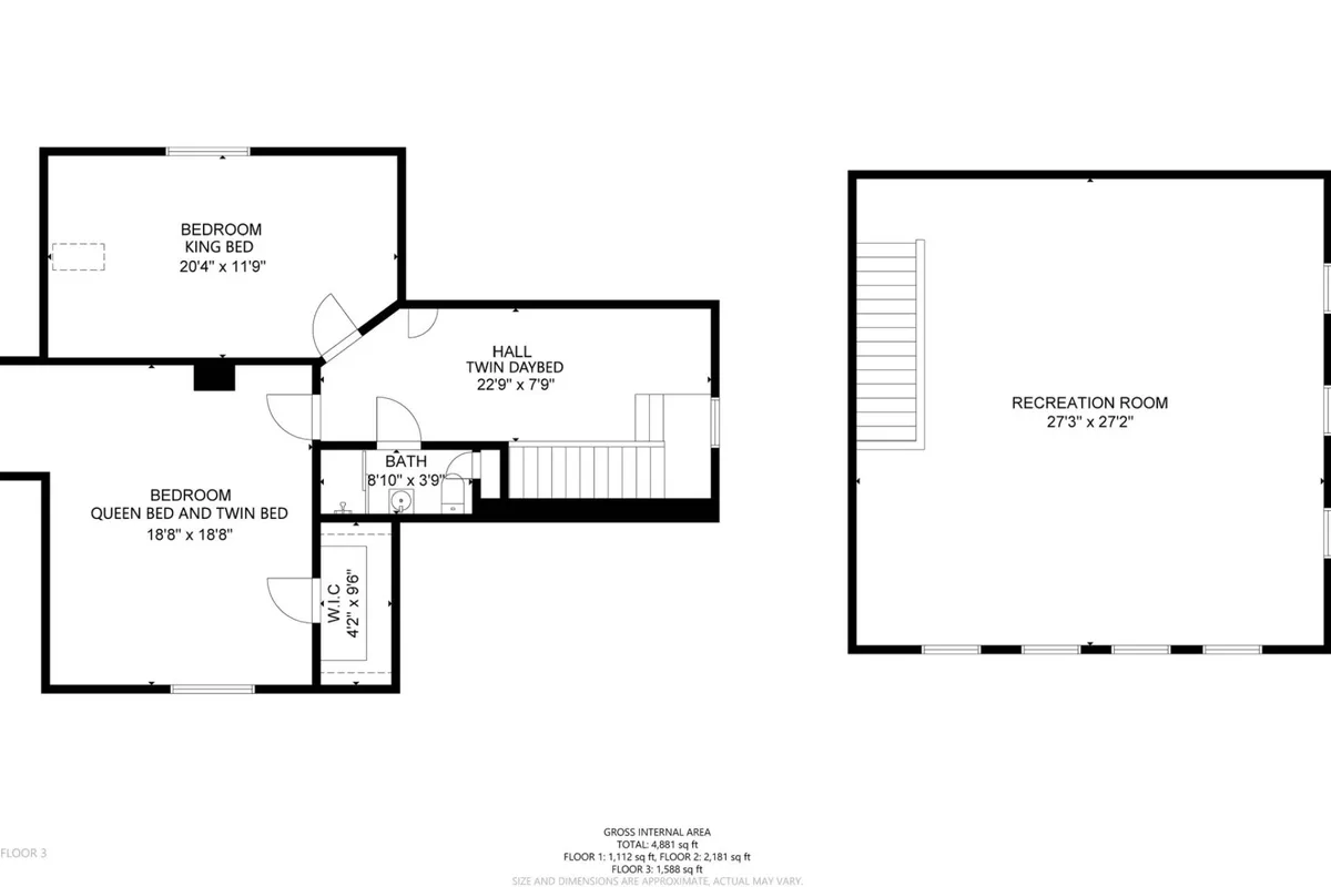 This image shows a cozy interior setup featuring a king bed, queen bed, and twin bed within a recreation room space. The scene is warm and welcoming, ideal for families or groups, and highlights the multiple sleeping arrangements with inviting bedding and soft lighting.
