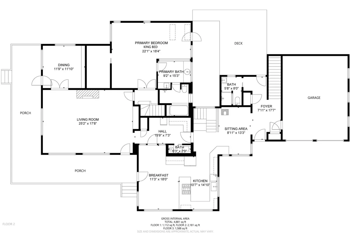A wide-angle view encompassing the primary bedroom, living room, kitchen, dining area, and deck, all bathed in natural light. The open-plan design fosters connection between spaces and the outdoors, with the deck suggesting the opportunity to step outside and enjoy nature after a day of exploration.
